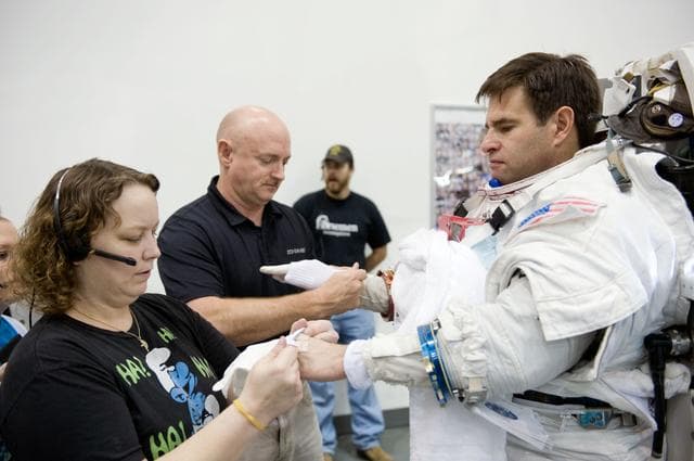 NASA image: STS-134 crew members Greg Chamitoff and Drew Feustel during their STS-134 ULF6 EVA1 training at the NBL. 