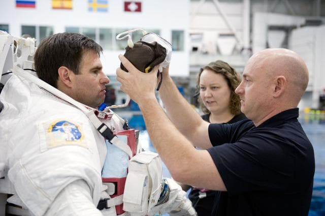 NASA image: STS-134 crew members Greg Chamitoff and Drew Feustel during their STS-134 ULF6 EVA1 training at the NBL. 