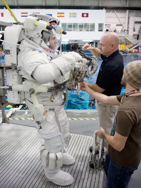 NASA image: STS-134 crew members Greg Chamitoff and Drew Feustel during their STS-134 ULF6 EVA1 training at the NBL. 