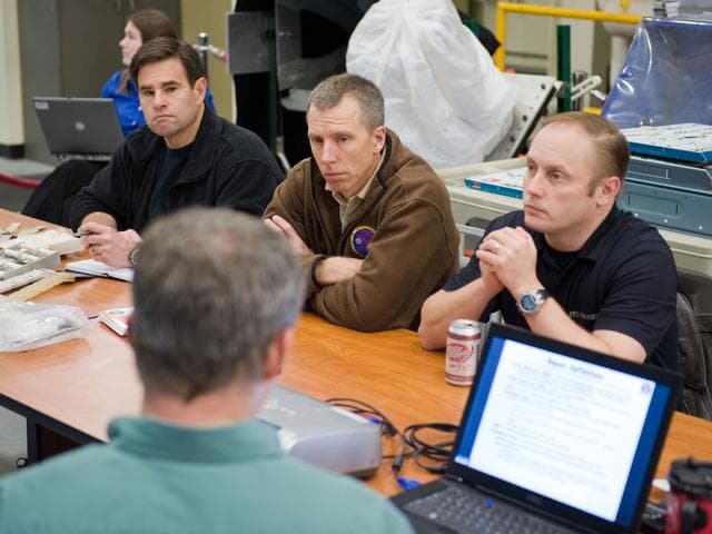 NASA image: STS-134 crew members Mike Fincke, Drew Feustel and Greg Chamitoff performing EVA Tile Repair Training.