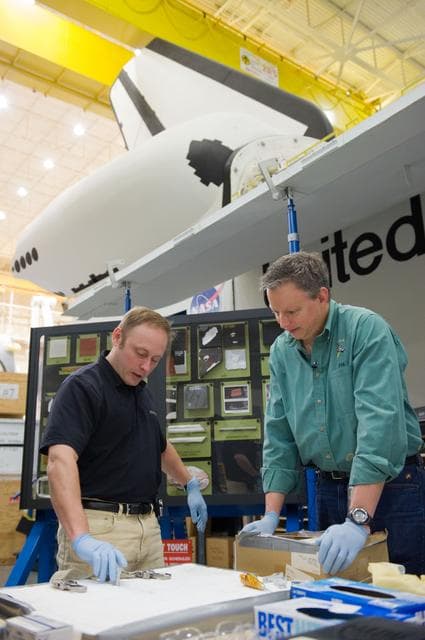 NASA image: STS-134 crew members Mike Fincke, Drew Feustel and Greg Chamitoff performing EVA Tile Repair Training. 