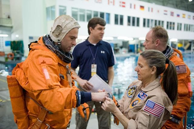 NASA image: STS-134 water survival training at the NBL
