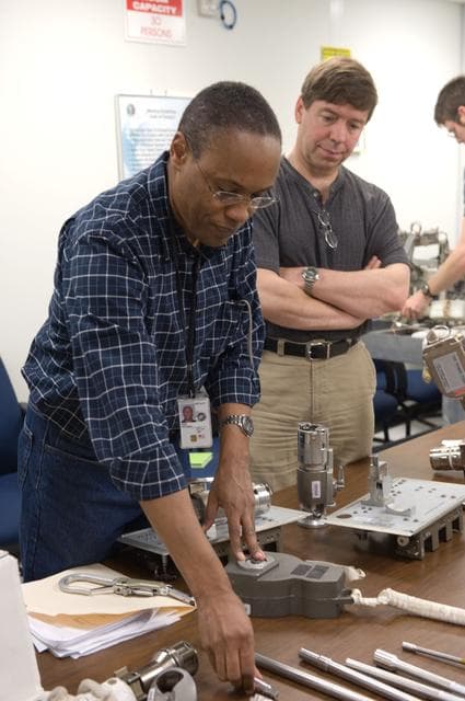 NASA image: STS-133 crew during ISS Small Tools training with instructor Jake Delap. 