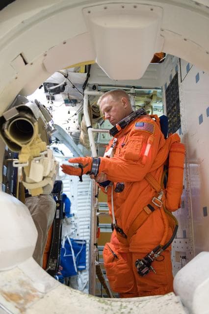 NASA image: STS-133 crew during Payload Egress training in Full Fuselage Trainer (FFT) 