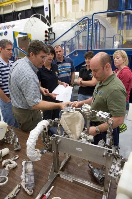 NASA image: STS-132 crew during ISS TOOL Configuration with instructor Lisa Shore. 