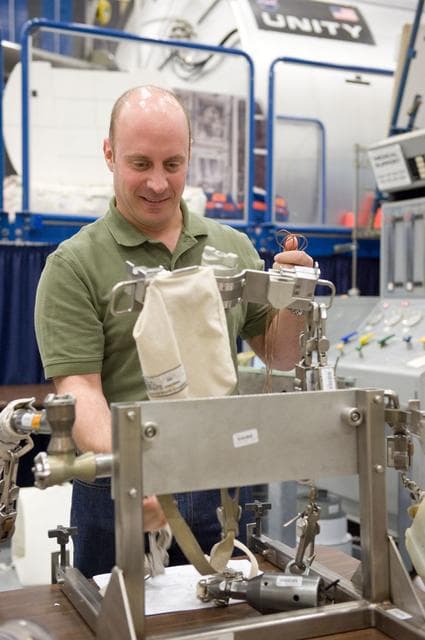NASA image: STS-132 crew during ISS TOOL Configuration with instructor Lisa Shore. 
