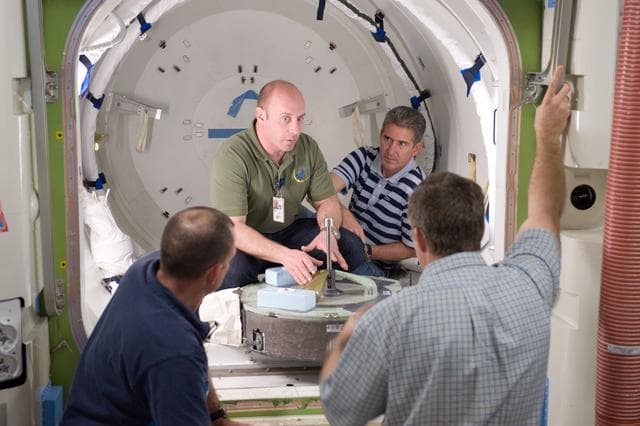 NASA image: STS-132 crew during ISS TOOL Configuration with instructor Lisa Shore. 
