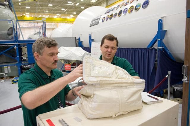 NASA image: Expedition 25 crew members, Kaleri, Skripochka and S. Kelly during routine ops training.