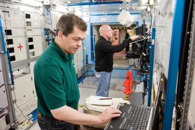 NASA image: Expedition 25 crew members, Kaleri, Skripochka and S. Kelly during routine ops training. 