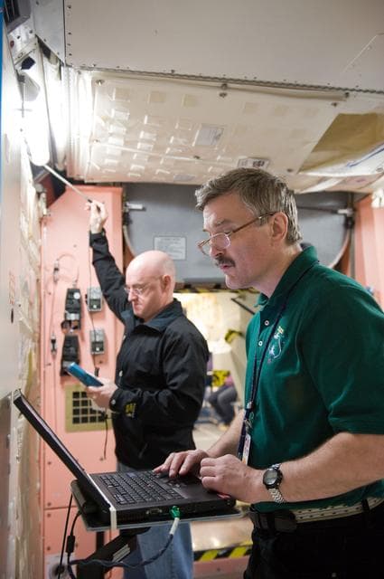 NASA image: Expedition 25 crew members, Kaleri, Skripochka and S. Kelly during routine ops training. 