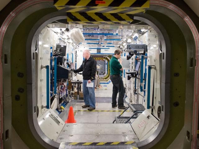 NASA image: Expedition 25 crew members, Kaleri, Skripochka and S. Kelly during routine ops training. 