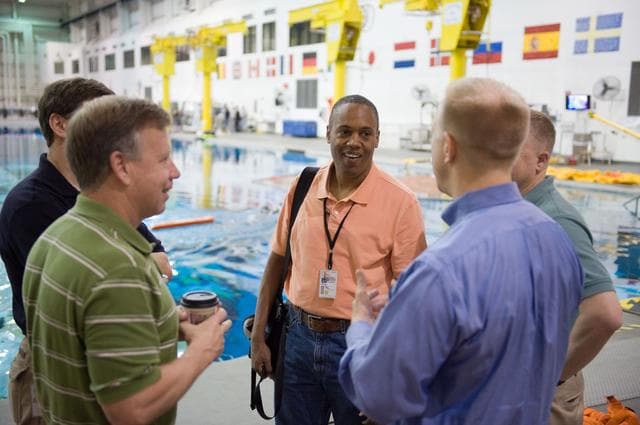 NASA image: STS-133 crew during water survival training at the NBL