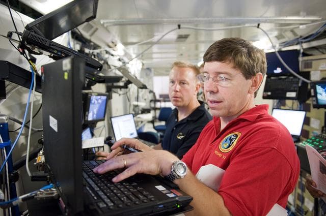 NASA image: STS-133 crew during S2 CBM/ROBO INSTALL 31178 training