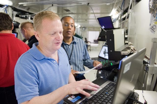 NASA image: STS-133 crew during S2 CBM/ROBO INSTALL 31178 training