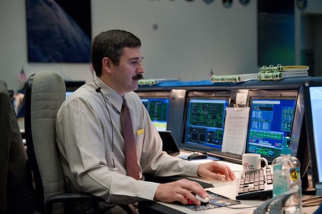 NASA image: STS-132/ULF4  Flight Controllers on Console - Bldg. 30 south