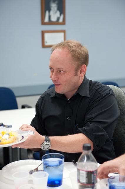 NASA image: STS-134 crew during food tasting session in JSC Food Lab.