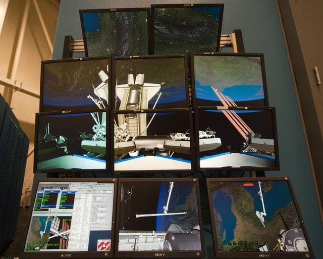 NASA image: STS-133 crew members Mike Barratt and Nicole Stott in cupola