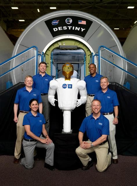 NASA image: Robonaut Project: STS-133 crew with Robonaut (R2)