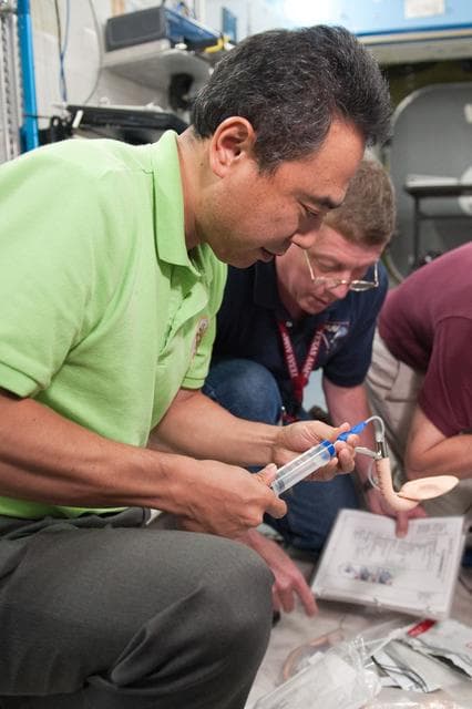 NASA image: Expedition 28 crew members Mike Fossum, Satoshi Furukawa, Sergei Volkov 