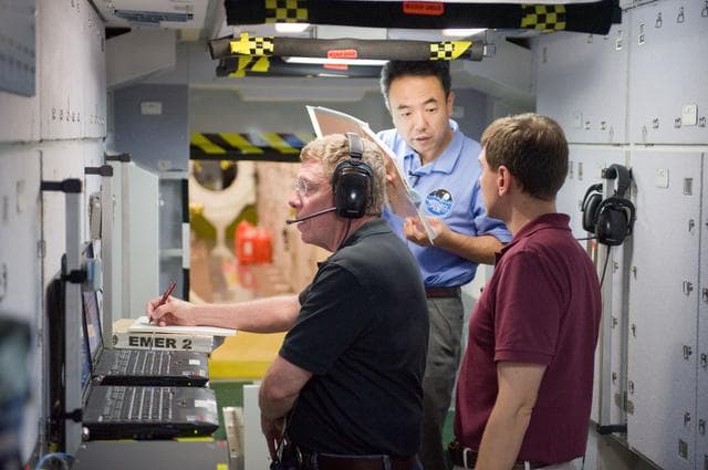 NASA image: ISS 28 crew member Mike Fossum, Satoshi Furukawa, Sergei Volkov  