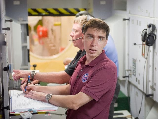 NASA image: ISS 28 crew member Mike Fossum, Satoshi Furukawa, Sergei Volkov  