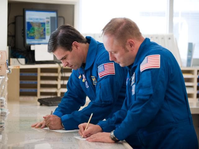 NASA image: STS-134 crew as they prepare their flight to KSC in T-38's