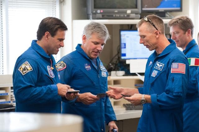 NASA image: STS-134 crew as they prepare their flight to KSC in T-38's