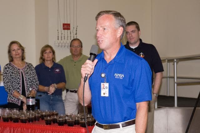 NASA image: STS-133 cake cutting ceremony marking the end of their training.  