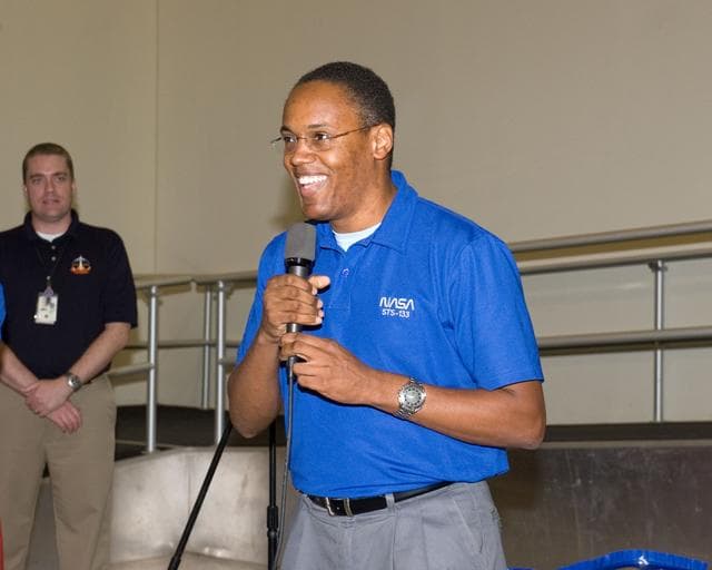 NASA image: STS-133 cake cutting ceremony marking the end of their training.  