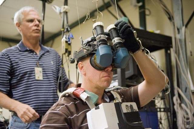 NASA image: STS-133 crew during MSS/EVAA TEAM training in Virtual Reality Lab  