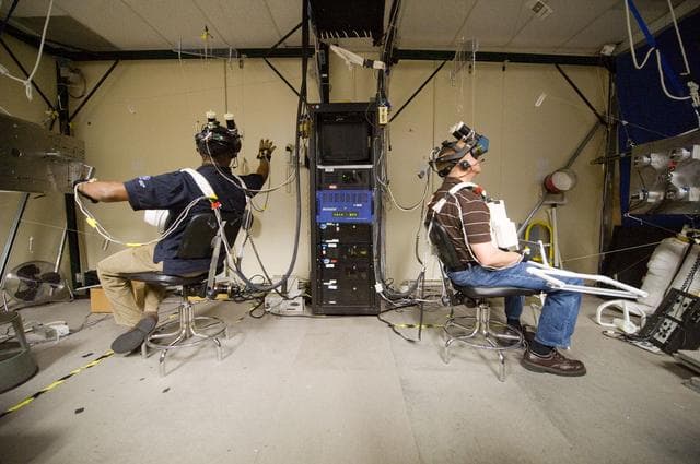 NASA image: STS-133 crew during MSS/EVAA TEAM training in Virtual Reality Lab  