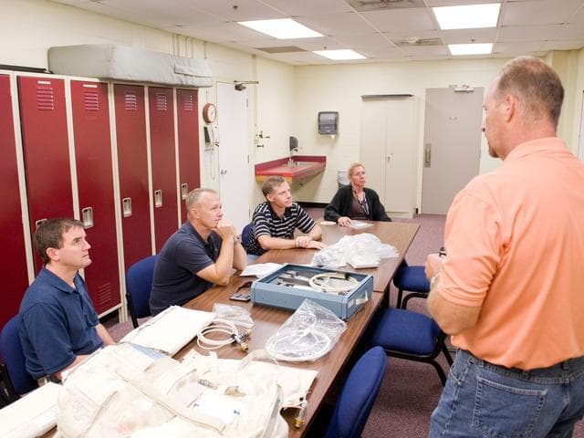 NASA image: STS-135 (335) crew during Water Ops training with instructor Rob Tomaro