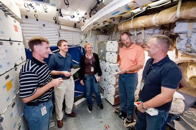 NASA image: STS-135 (335) crew during Water Ops training with instructor Rob Tomaro  