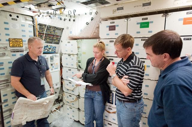 NASA image: STS-135 (335) crew during Water Ops training with instructor Rob Tomaro  