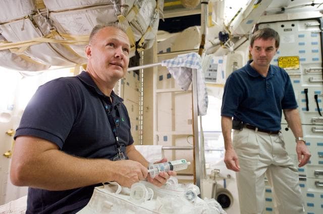 NASA image: STS-135 (335) crew during Water Ops training with instructor Rob Tomaro  