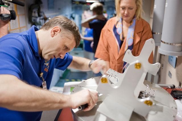 NASA image: Expedition 27 crew members Ron Garan, Andre Borisenko and Aleksandr Samokutyaev   