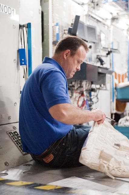 NASA image: Expedition 27 crew members Ron Garan, Andre Borisenko and Aleksandr Samokutyaev   