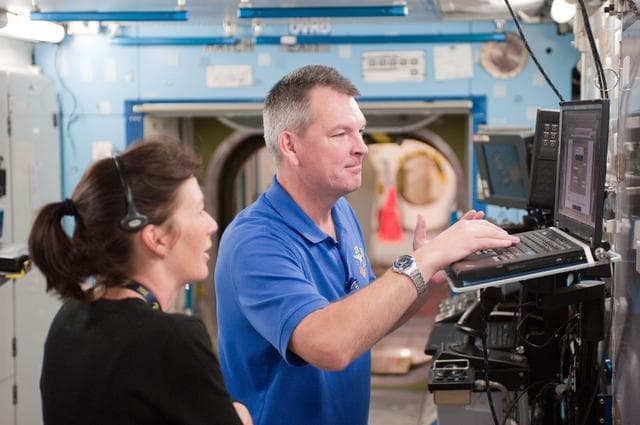 NASA image: Expedition 27 crew members Ron Garan, Andre Borisenko and Aleksandr Samokutyaev   
