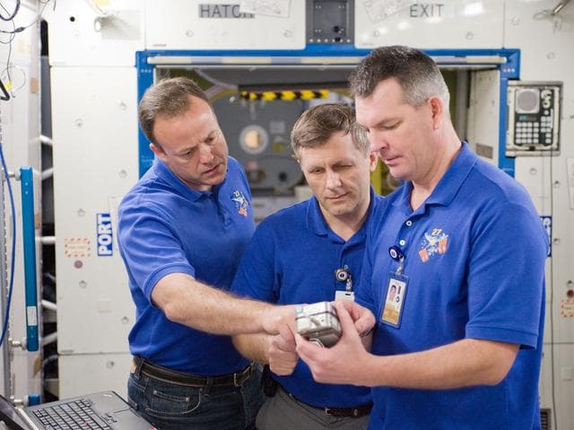 NASA image: Expedition 27 crew members Ron Garan, Andre Borisenko and Aleksandr Samokutyaev   