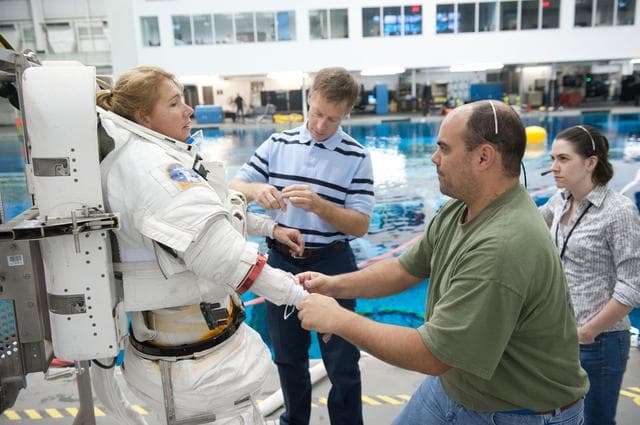 NASA image: STS-335 (135) crew members Rex Walheim and Sandy Magnus  