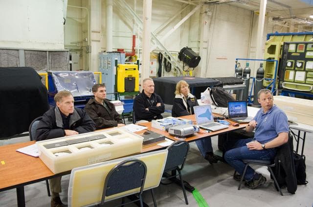 NASA image: STS-335 crew training, EVA TPS Overview with instructor John Ray    