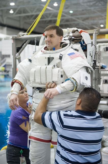 NASA image: Expedition 27 crew member Ron Garan with STS-335 crew member Rex Walheim  