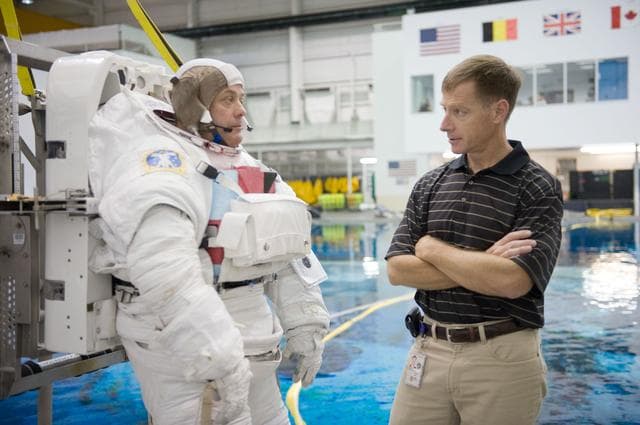 NASA image: Expedition 27 crew member Ron Garan with STS-335 crew member Rex Walheim  
