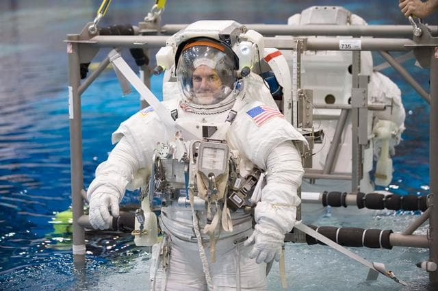 NASA image: Expedition 27 crew member Ron Garan with STS-335 crew member Rex Walheim  