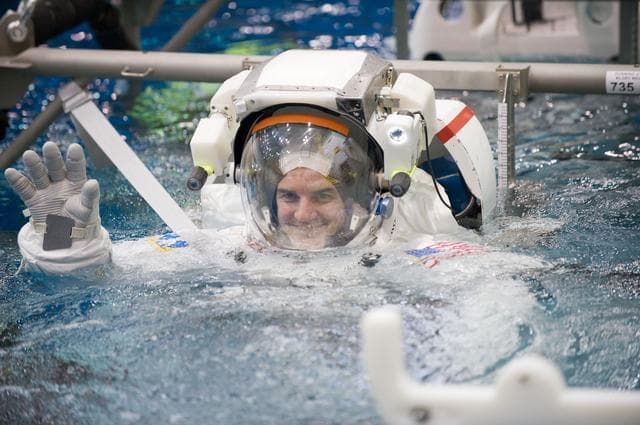 NASA image: Expedition 27 crew member Ron Garan with STS-335 crew member Rex Walheim  