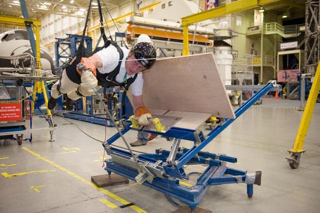 NASA image: STS134 crew during EVA PGT POGO and EVA 1 tag up with instructors Allison Bolinger and Vicky Otto.