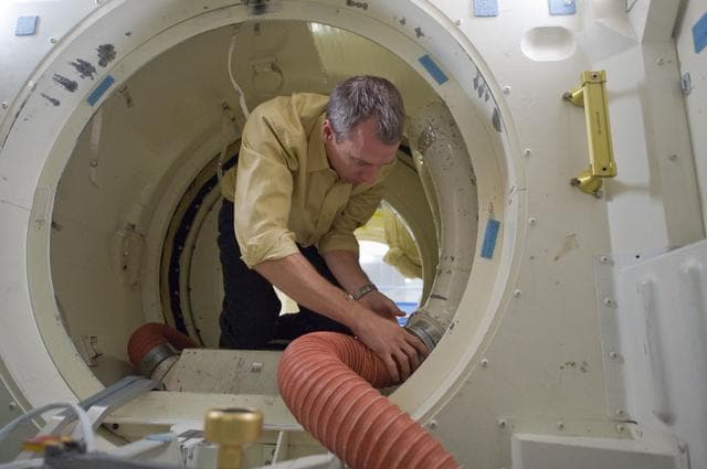 NASA image: STS-134 crew during Ingress/Egress training with instructor Glenn Johnson   