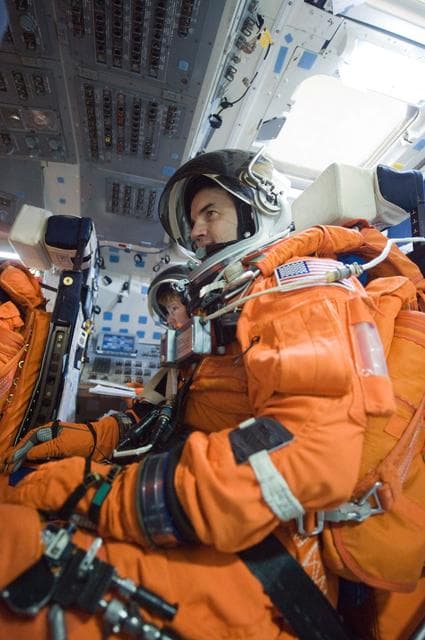 NASA image: STS-335 crew during CCTII Post Insertion/Deorbit Prep 91020