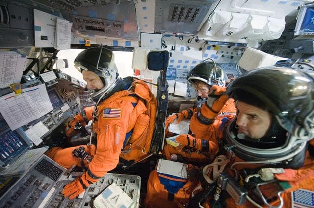NASA image: STS-335 crew during CCTII Post Insertion/Deorbit Prep 91020