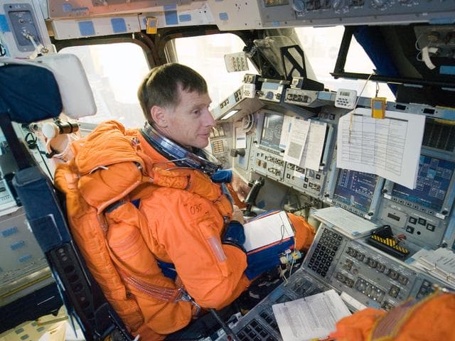 NASA image: STS-335 crew during CCTII Post Insertion/Deorbit Prep 91020